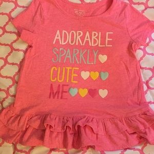 Girls pink t-shirt with ruffles in bottom